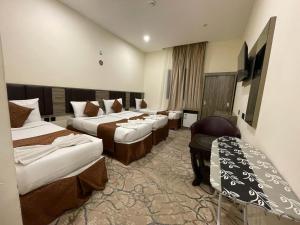 Voodi või voodid majutusasutuse Mila HOTEL MAKKAH toas