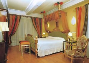 Ένα ή περισσότερα κρεβάτια σε δωμάτιο στο Posada del Indiano +48 φωτογραφίες