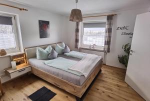 Postel nebo postele na pokoji v ubytování Haus Bergreich
