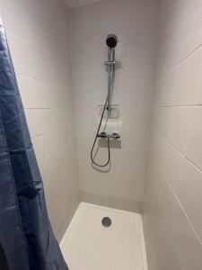 a bathroom with a shower and a toilet in it at Grand T4 lumineux proche du lac de Molières in Molières