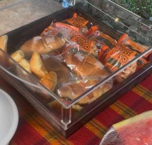 a plastic container filled with different types of food at Jardin al Bosque-Glamping in San Juan