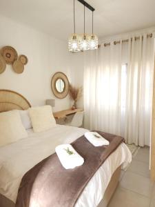 Voodi või voodid majutusasutuse Bohemian Escape Midrand toas