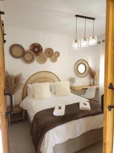 Voodi või voodid majutusasutuse Bohemian Escape Midrand toas