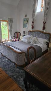 Postel nebo postele na pokoji v ubytování The Lions Den - La Loge Guest House + 37 fotografií