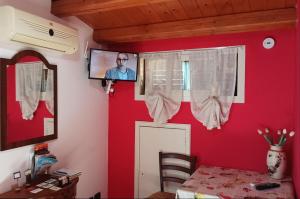 TV a/nebo společenská místnost v ubytování Bed & Breakfast Scicli