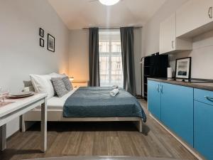 Postel nebo postele na pokoji v ubytování ELSO apartments