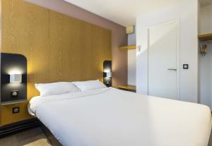 Postel nebo postele na pokoji v ubytování B&B HOTEL Perpignan Sud Porte d'Espagne