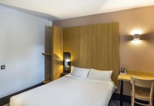 Postel nebo postele na pokoji v ubytování B&B HOTEL Perpignan Sud Porte d'Espagne