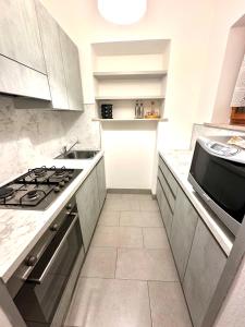 Kuchyň nebo kuchyňský kout v ubytování Villa Serena B&B Seren del Grappa