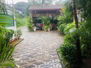 Zahrada ubytování Dilshan Tourist Home