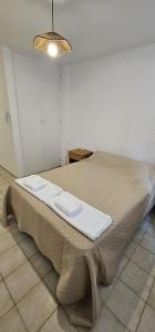 Postel nebo postele na pokoji v ubytování Monoambiente Centro