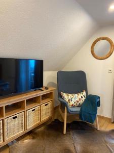 TV a/nebo společenská místnost v ubytování Ferienhaus in Mariahof