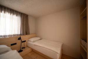 Postelja oz. postelje v sobi nastanitve Calva B&B Apartments