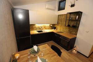 Kuchyň nebo kuchyňský kout v ubytování Tiny House Útulno