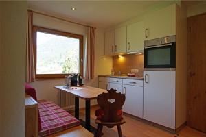 Kuchyň nebo kuchyňský kout v ubytování Matschun Appartements