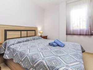Ένα ή περισσότερα κρεβάτια σε δωμάτιο στο Apartment Salsadellans by Interhome