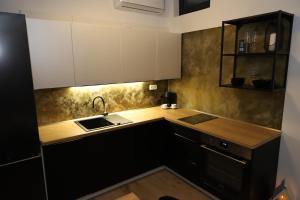 Kuchyň nebo kuchyňský kout v ubytování Tiny House Útulno