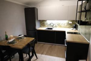 Kuchyň nebo kuchyňský kout v ubytování Tiny House Útulno