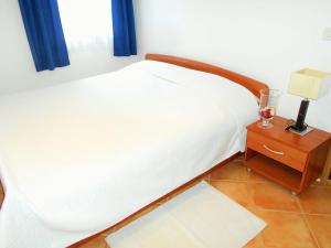 Posteľ alebo postele v izbe v ubytovaní Apartments Doda