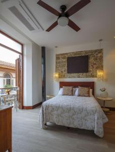 Postel nebo postele na pokoji v ubytování Villas La Fontana Amplias ApartaSuite-piscina 201