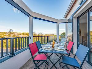 a patio with a table and chairs on a balcony at Apartment Collioure le haut-1 by Interhome in Collioure
