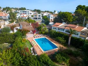 an aerial view of a house with a swimming pool at Villa La Familia by Interhome in Benissa