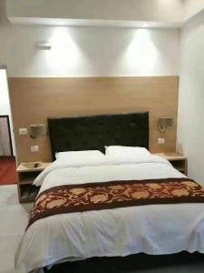 Postel nebo postele na pokoji v ubytování Hotel Alba