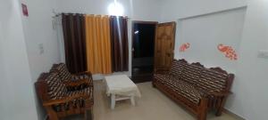 Posezení v ubytování Snowdrop inn coorg