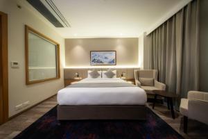 Postel nebo postele na pokoji v ubytování Best Western Plus Kathmandu