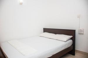 Postel nebo postele na pokoji v ubytování JC'S White House