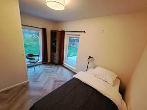 Ένα ή περισσότερα κρεβάτια σε δωμάτιο στο Erve Lindehof +28 φωτογραφίες