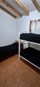 Postel nebo postele na pokoji v ubytování Calendulas del Cabo