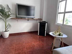 TV a/nebo společenská místnost v ubytování La escalera