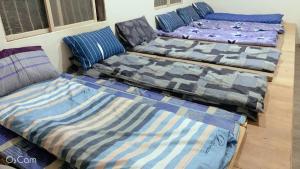 Ein Bett oder Betten in einem Zimmer der Unterkunft Chen The House