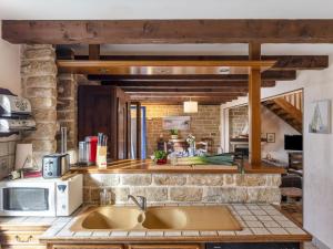 Dapur atau dapur kecil di Holiday Home Kergrim-2 by Interhome