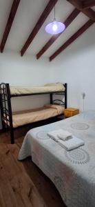 Postel nebo postele na pokoji v ubytování Calendulas del Cabo + 27 fotografií