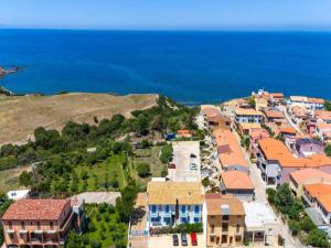 an aerial view of a small town next to the ocean at Apartment Mare Azzurro by Interhome in La Ciaccia