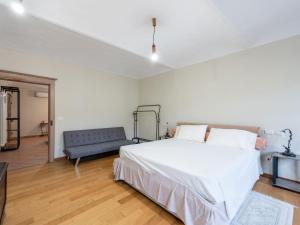 Postel nebo postele na pokoji v ubytování Apartment Coccoapartment by Interhome