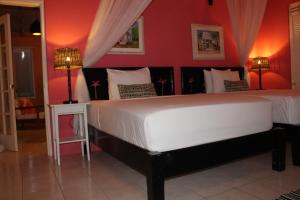 Letto o letti in una camera di Sugarapple Bequia