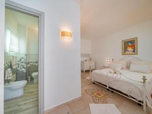 Ένα ή περισσότερα κρεβάτια σε δωμάτιο στο Apartment Desvelos by Interhome