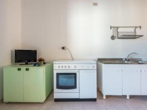 Η κουζίνα ή μικρή κουζίνα στο Apartment Casa Arangiu 2 by Interhome