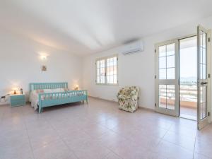 Ένα ή περισσότερα κρεβάτια σε δωμάτιο στο Apartment Casa Arangiu 2 by Interhome
