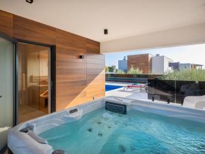 Bazén v ubytování Villa Old Olive VI by Interhome nebo v jeho okolí