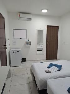 Krevet ili kreveti u jedinici u okviru objekta Pousada - Suíte Excelente