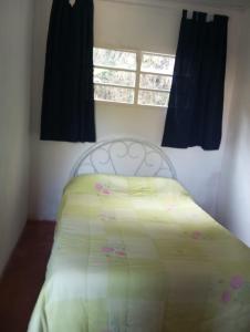 Postel nebo postele na pokoji v ubytování hostel do Mineiro São Bento Sapucaí 2
