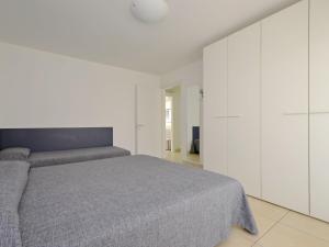 Ένα ή περισσότερα κρεβάτια σε δωμάτιο στο Apartment Mare-7 by Interhome