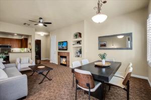 a living room with a dining table and a living room at Relax & Recharge at this 2BR Desert Villa in La Quinta