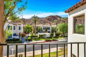 a view of a neighborhood from a balcony of a house at Relax & Recharge at this 2BR Desert Villa in La Quinta