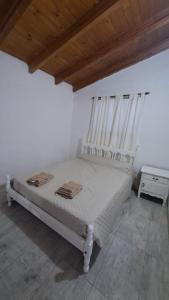 Ένα ή περισσότερα κρεβάτια σε δωμάτιο στο Casa Villa Naturaleza