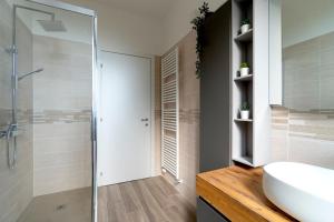 Koupelna v ubytování Triple room in Frassino Apartment